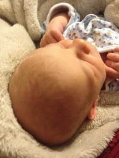 Alaina took this pic of his sweet little (apparently blonde!) head.